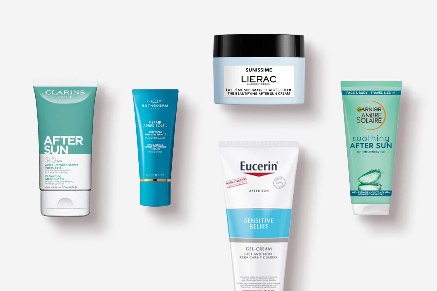 Clarins After Sun Gel, Institut Esthederm Repair Après-Soleil, Lierac Sunissime cream, Eucerin Sensitive Relief gel-cream and Garnier Ambre Solaire on grey. Clarins After Sun Gel, Institut Esthederm Repair Après-Soleil, Lierac Sunissime cream, Eucerin Sensitive Relief gel-cream and Garnier Ambre Solaire on grey.