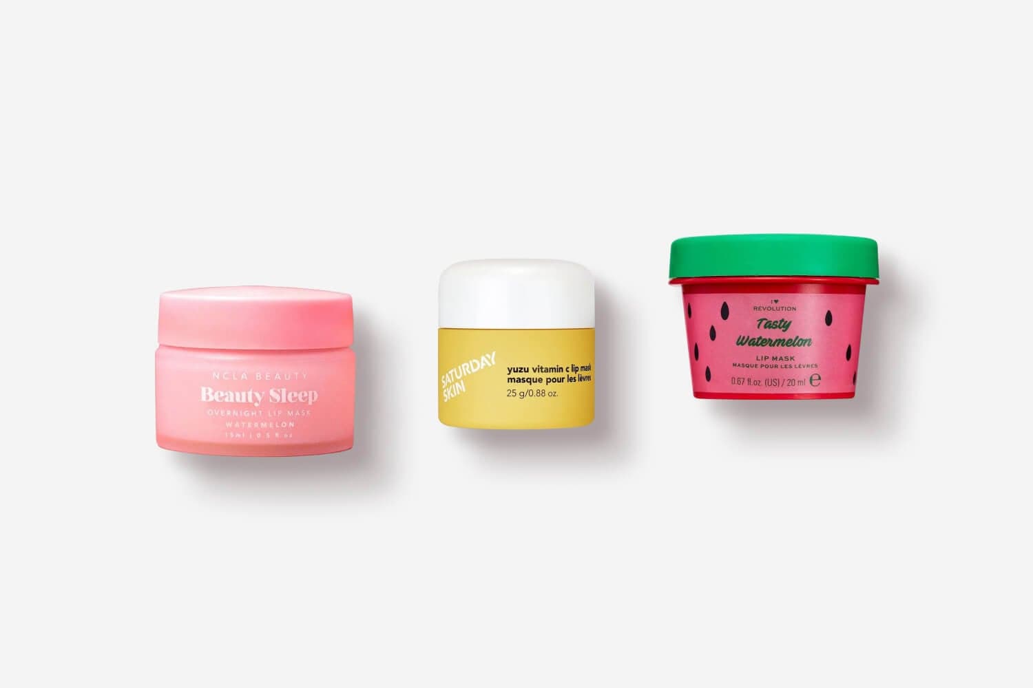 Three lip mask pots on white: NCLA Beauty Beauty Sleep Watermelon, Saturday Skin Yuzu Vitamin C and I Heart Revolution Tasty Watermelon. Three lip mask pots on white: NCLA Beauty Beauty Sleep Watermelon, Saturday Skin Yuzu Vitamin C and I Heart Revolution Tasty Watermelon.