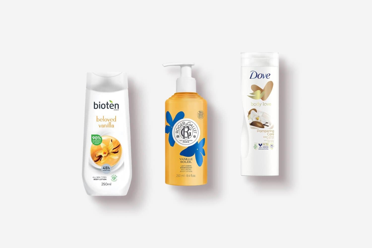 Bioten Beloved Vanilla body lotion, Roger & Gallet Vanille Soleil body lotion and Dove Body Love Pampering Care lotion on grey. Bioten Beloved Vanilla body lotion, Roger & Gallet Vanille Soleil body lotion and Dove Body Love Pampering Care lotion on grey.