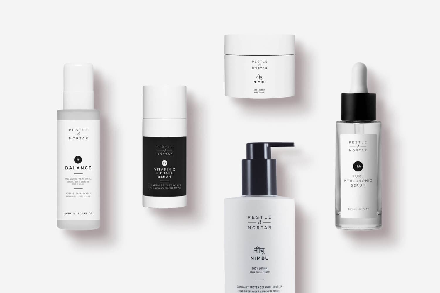Pestle & Mortar Balance facial spritz, Vitamin C 2 Phase Serum, Nimbu Body Butter and Lotion, and Pure Hyaluronic Serum on grey. Pestle & Mortar Balance facial spritz, Vitamin C 2 Phase Serum, Nimbu Body Butter and Lotion, and Pure Hyaluronic Serum on grey.