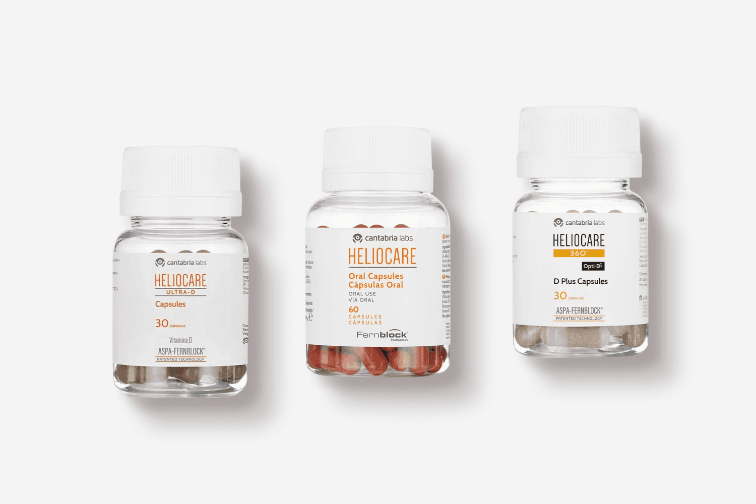 Three Cantabria Labs jars side by side: Heliocare Ultra-D Capsules 30, Heliocare Oral Capsules 60 with Fernblock, and Heliocare 360 Opti-D Plus Capsules 30. Three Cantabria Labs jars side by side: Heliocare Ultra-D Capsules 30, Heliocare Oral Capsules 60 with Fernblock, and Heliocare 360 Opti-D Plus Capsules 30.