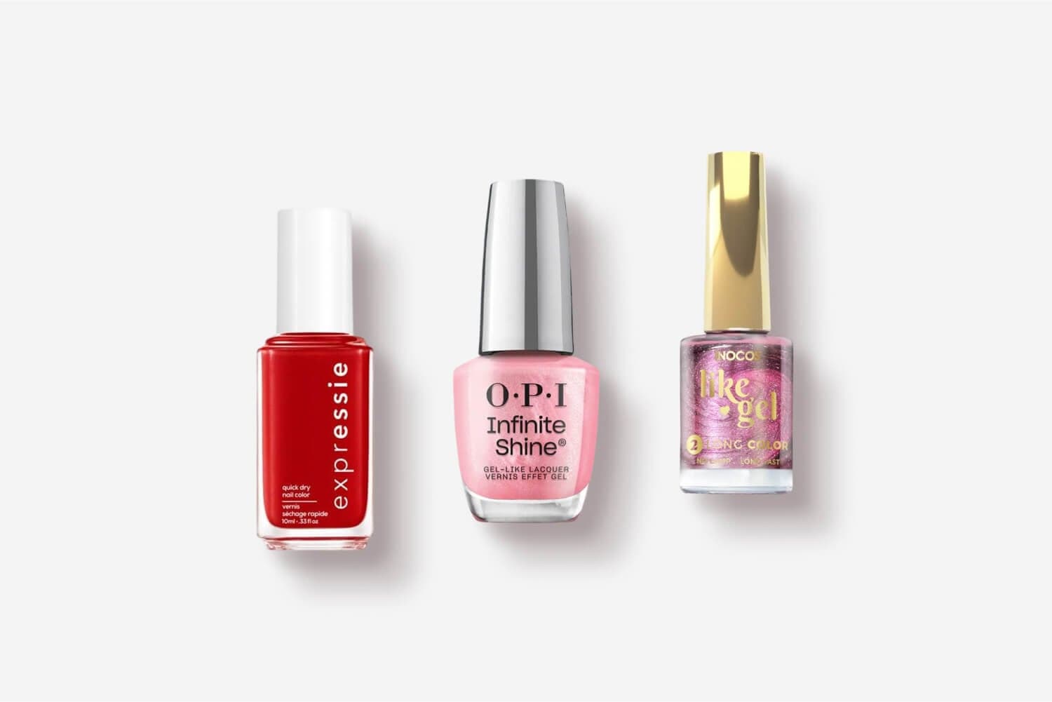 Three polish bottles on grey: red Essie Expressie quick dry, pink OPI Infinite Shine gel-like lacquer and Nocos Like Gel Long Color. Three polish bottles on grey: red Essie Expressie quick dry, pink OPI Infinite Shine gel-like lacquer and Nocos Like Gel Long Color.