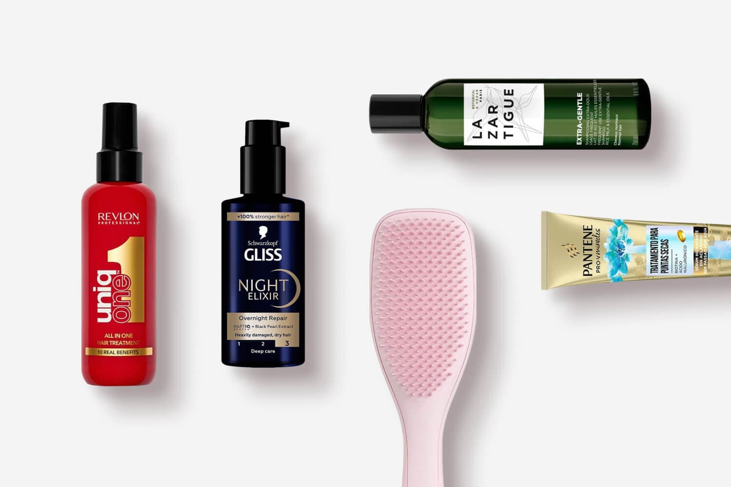 Revlon Professional UniqOne, Schwarzkopf Gliss Night Elixir, Lazartigue Extra-Gentle shampoo, a pink detangling brush and Pantene Pro-V split-ends cream. Revlon Professional UniqOne, Schwarzkopf Gliss Night Elixir, Lazartigue Extra-Gentle shampoo, a pink detangling brush and Pantene Pro-V split-ends cream.