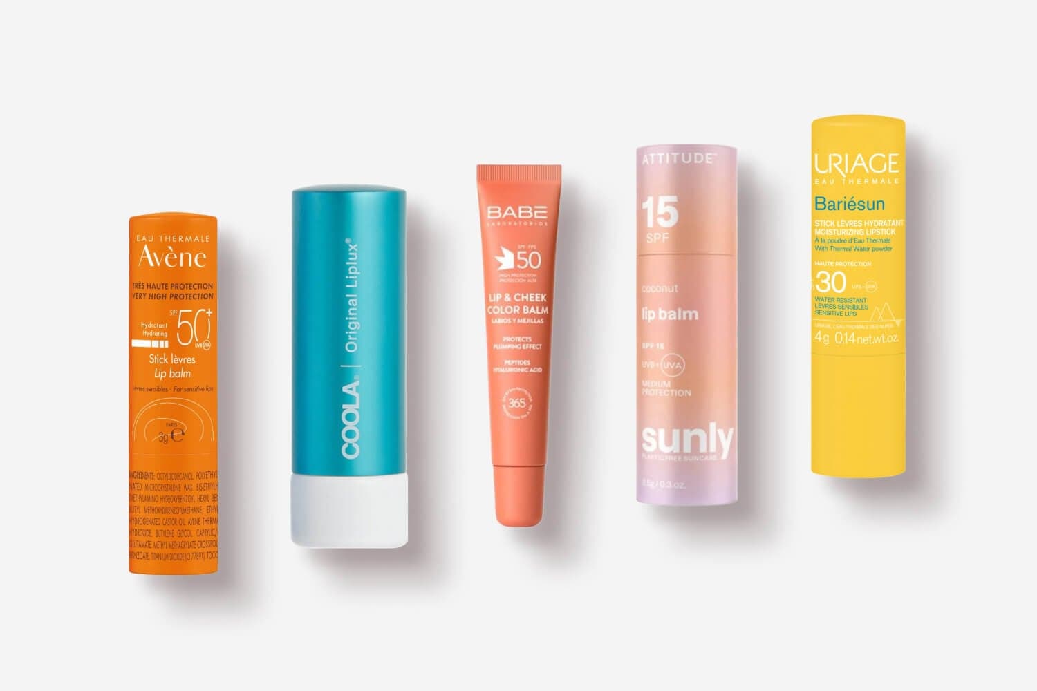 Avène SPF 50+ lip stick, COOLA Original Liplux, BABÉ SPF 50 Lip & Cheek Color Balm, Attitude Sunly coconut SPF 15 and Uriage Bariésun SPF 30 in a row. Avène SPF 50+ lip stick, COOLA Original Liplux, BABÉ SPF 50 Lip & Cheek Color Balm, Attitude Sunly coconut SPF 15 and Uriage Bariésun SPF 30 in a row.