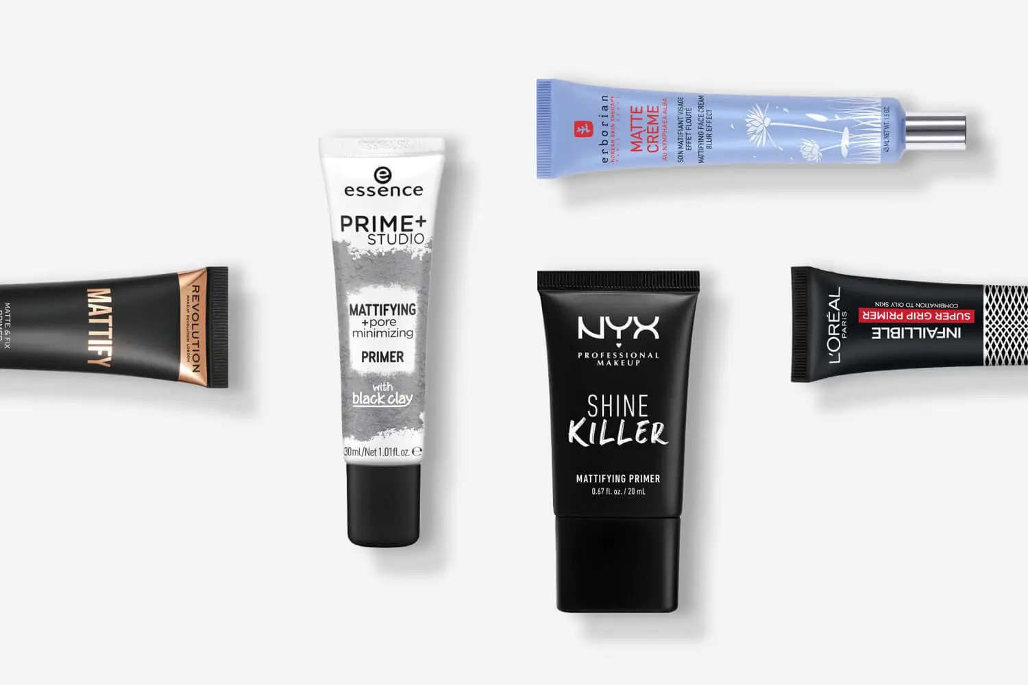 Makeup Revolution Mattify, essence Prime+ Studio, Erborian Matte Crème, NYX Shine Killer and L'Oréal Infaillible Super Grip primer tubes on grey.
