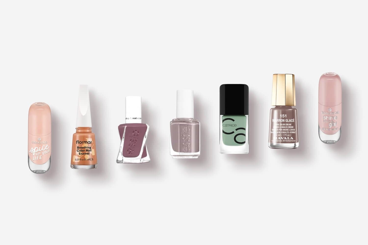 essence Spice Up Your Life, Flormar Breathing Color, two Essie polishes, Catrice, Mavala 151 Marron Glacé and essence Shine Last & Go bottles in a row essence Spice Up Your Life, Flormar Breathing Color, two Essie polishes, Catrice, Mavala 151 Marron Glacé and essence Shine Last & Go bottles in a row