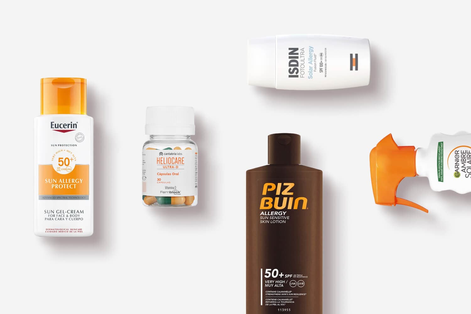 Eucerin Sun Allergy Protect SPF 50+, Heliocare Ultra-D capsules, ISDIN Fotoultra Solar Allergy, Piz Buin Allergy SPF 50+ and Garnier Ambre Solaire on grey. Eucerin Sun Allergy Protect SPF 50+, Heliocare Ultra-D capsules, ISDIN Fotoultra Solar Allergy, Piz Buin Allergy SPF 50+ and Garnier Ambre Solaire on grey.
