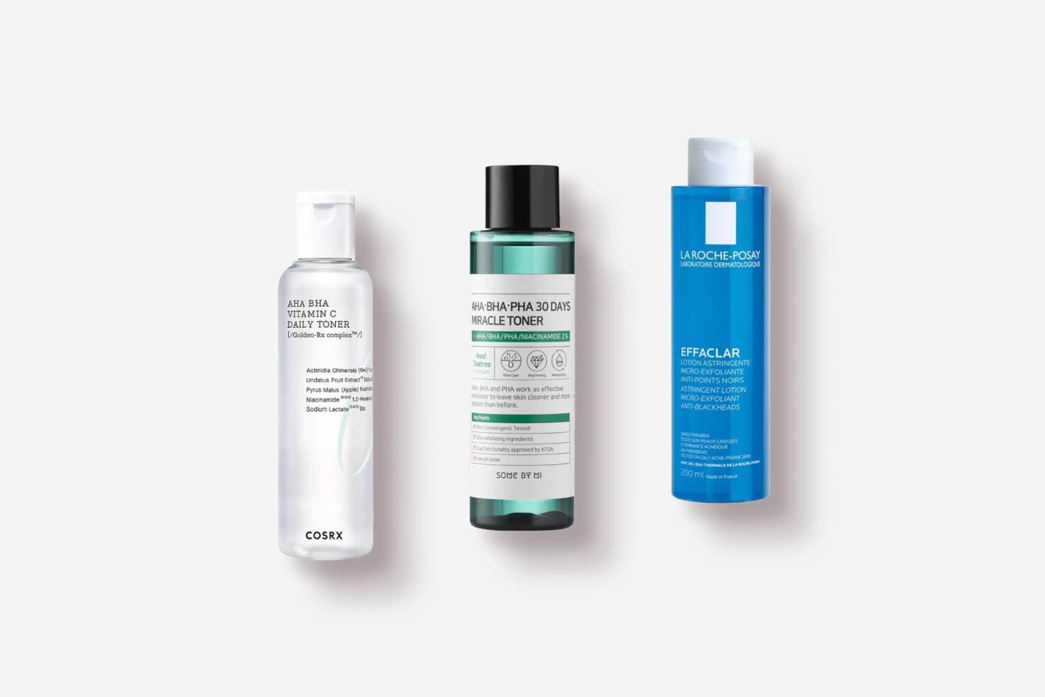 COSRX AHA BHA Vitamin C Daily Toner, Some By Mi AHA-BHA-PHA 30 Days Miracle Toner and La Roche-Posay Effaclar Astringent Lotion on grey. COSRX AHA BHA Vitamin C Daily Toner, Some By Mi AHA-BHA-PHA 30 Days Miracle Toner and La Roche-Posay Effaclar Astringent Lotion on grey.