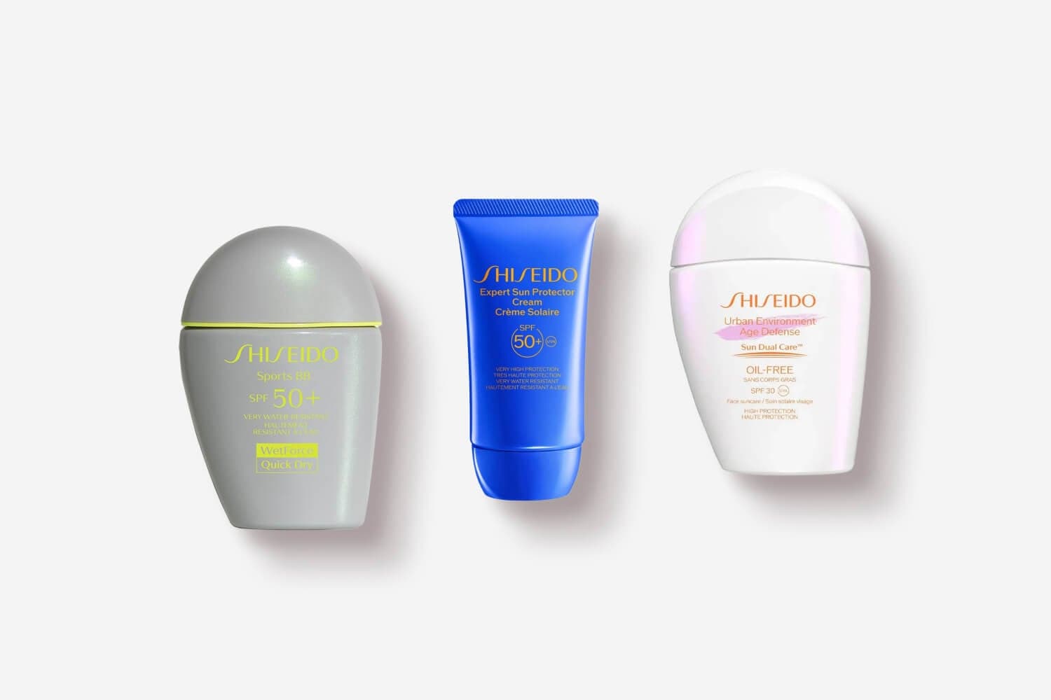 Shiseido Sports BB SPF 50+, blue Expert Sun Protector Cream SPF 50+ tube and white Urban Environment Age Defense Oil-Free SPF 30 Shiseido Sports BB SPF 50+, blue Expert Sun Protector Cream SPF 50+ tube and white Urban Environment Age Defense Oil-Free SPF 30